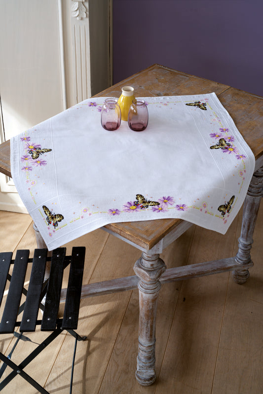 Cross stitched tablecloth with butterflies