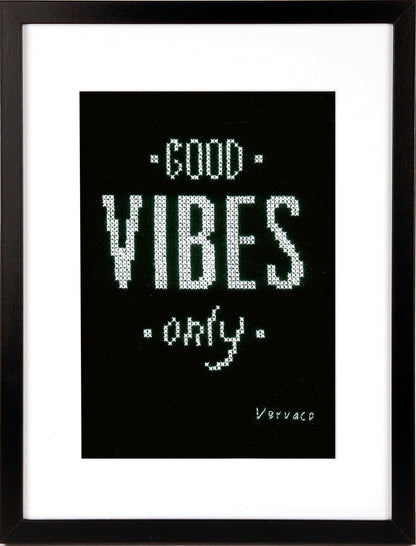 Cross stitched Good Vibes design on black fabric