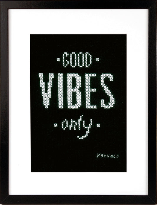 Cross stitched Good Vibes design on black fabric