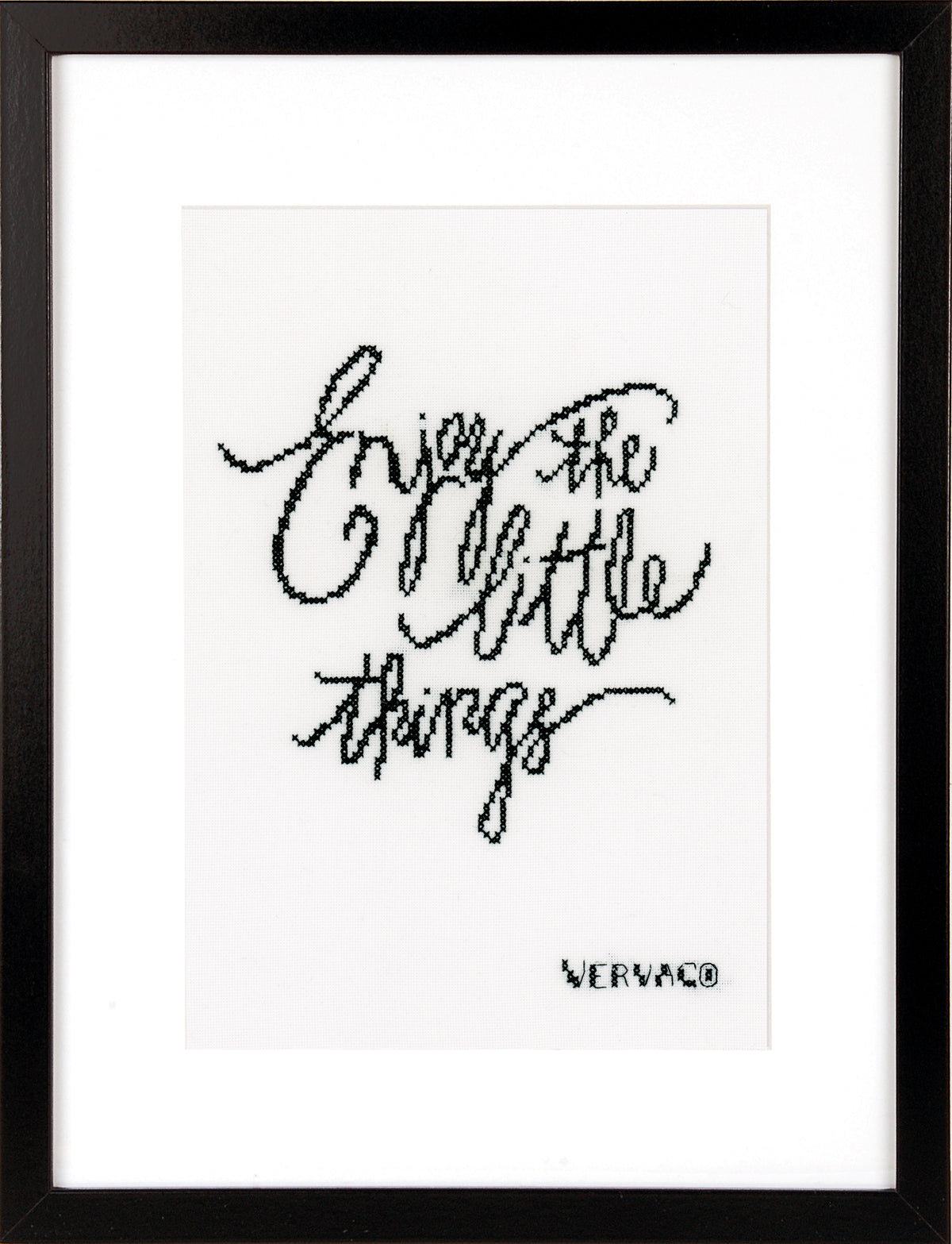 Cross stitched Enjoy the Little Things design on black fabric