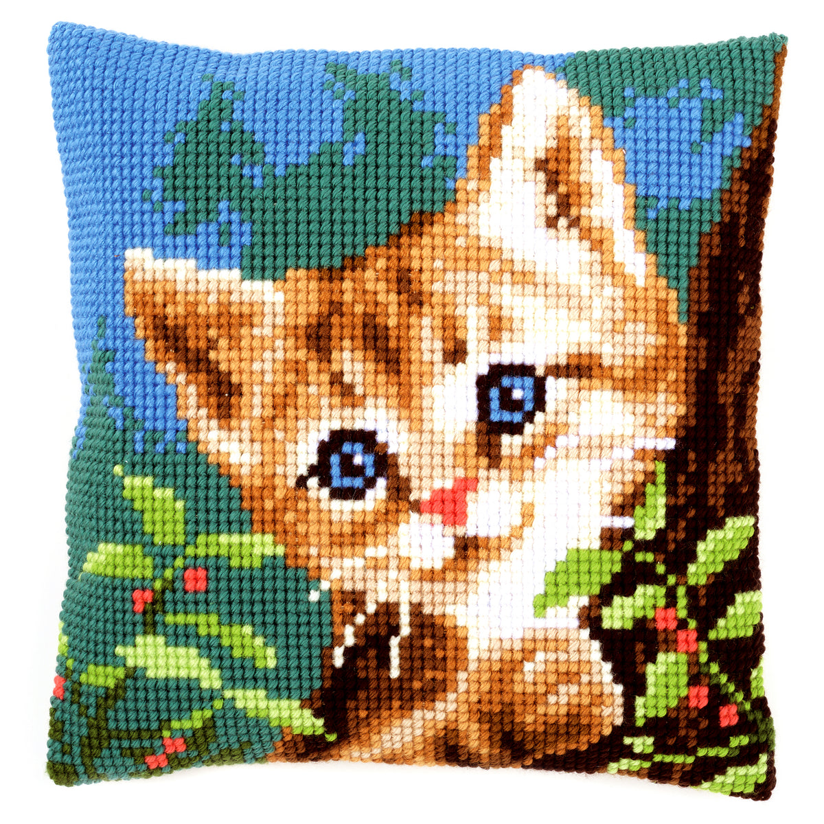 Cross stitch cushion with a cat on a tree