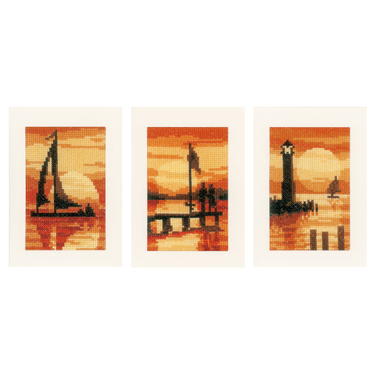 Three cross stitched sunset greetings cards