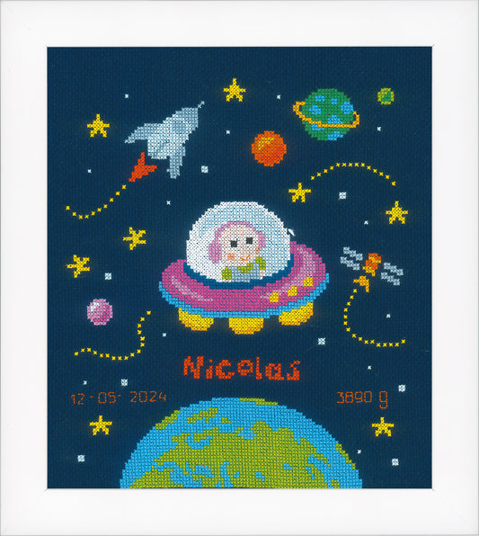 Baby astronaut cross stitch birth record on navy fabric