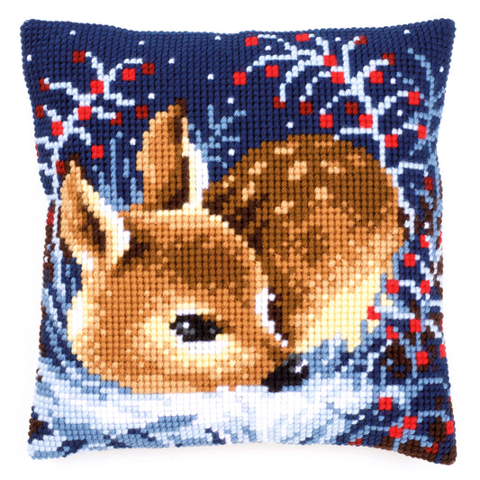 Cross stitch cushion showing a little deer design