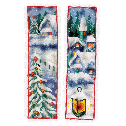 Two cross stitch bookmarks with winter village designs
