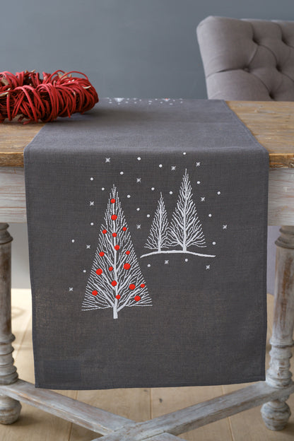 Dark grey embroidered table runner with Christmas trees