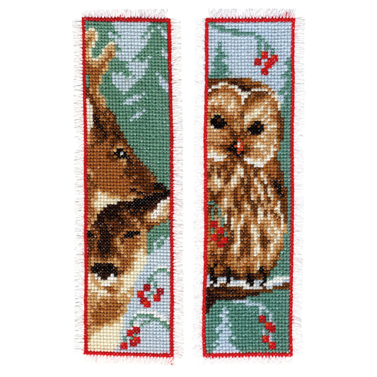 Two cross stitch bookmarks with an owl and a deer