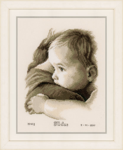 Cross stitch birth record with a baby hug design