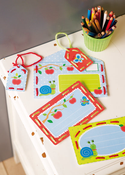 Children's stitched cards and tags with apples