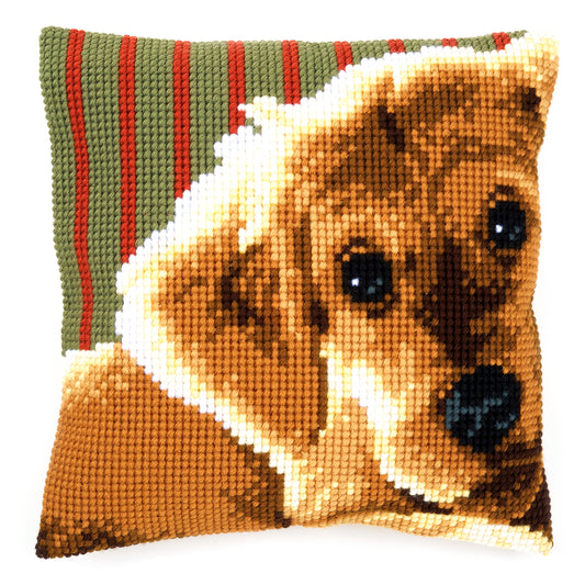 Cross stitch cushion showing a dog design
