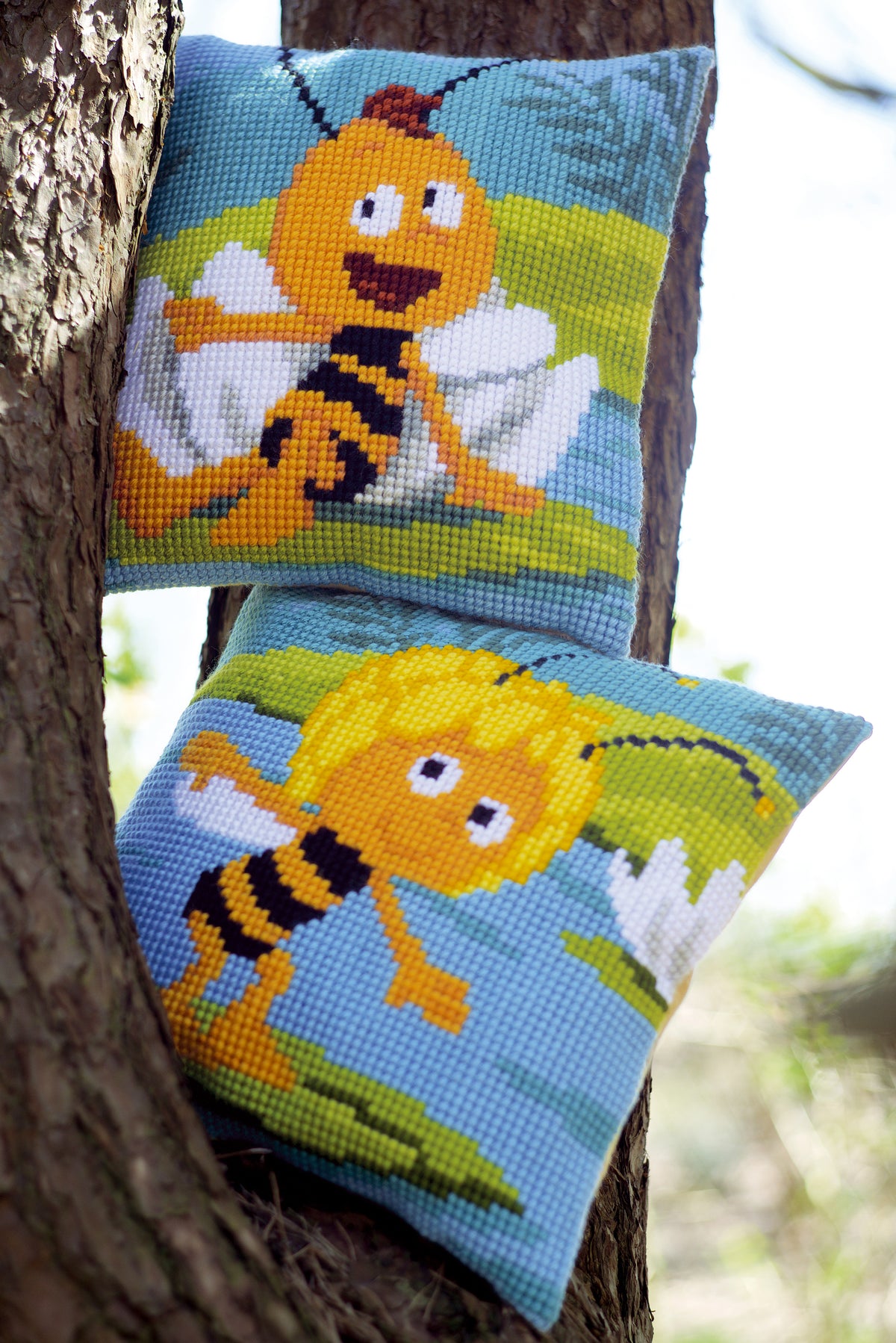 Cross stitch cushion with a Willy & Waterlily design