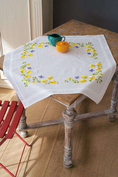 Embroidered white tablecloth with spring flowers