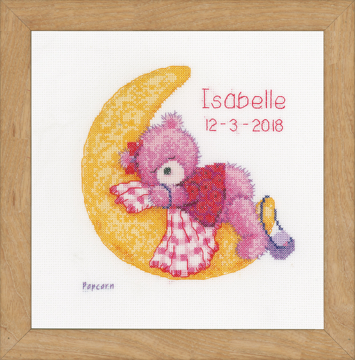 Finished Brie Bear on the Moon counted cross stitch design