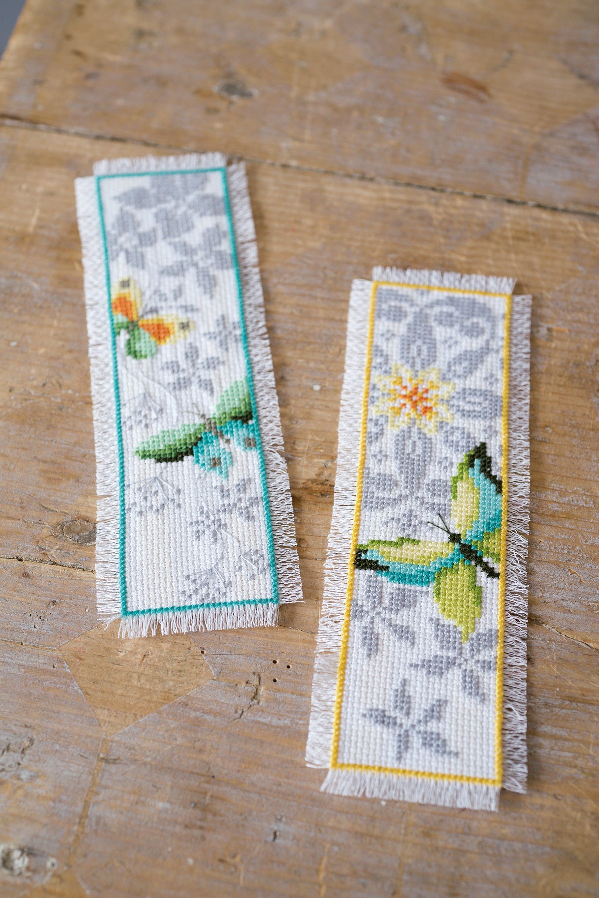 Two Vervaco cross stitch bookmarks with butterfly designs