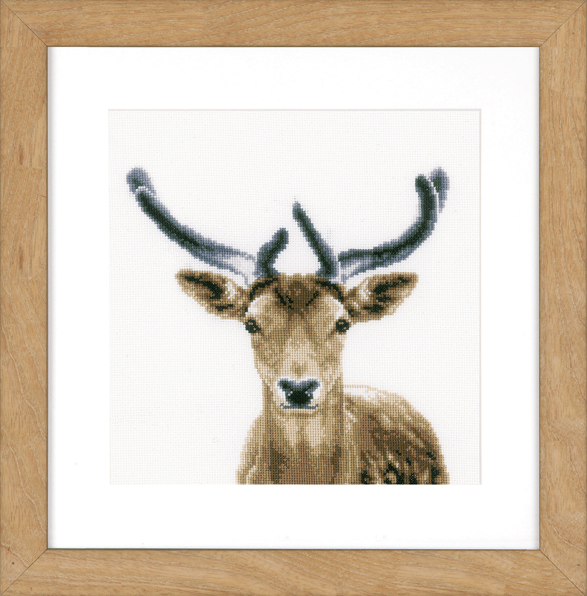 Cross stitch picture of a deer