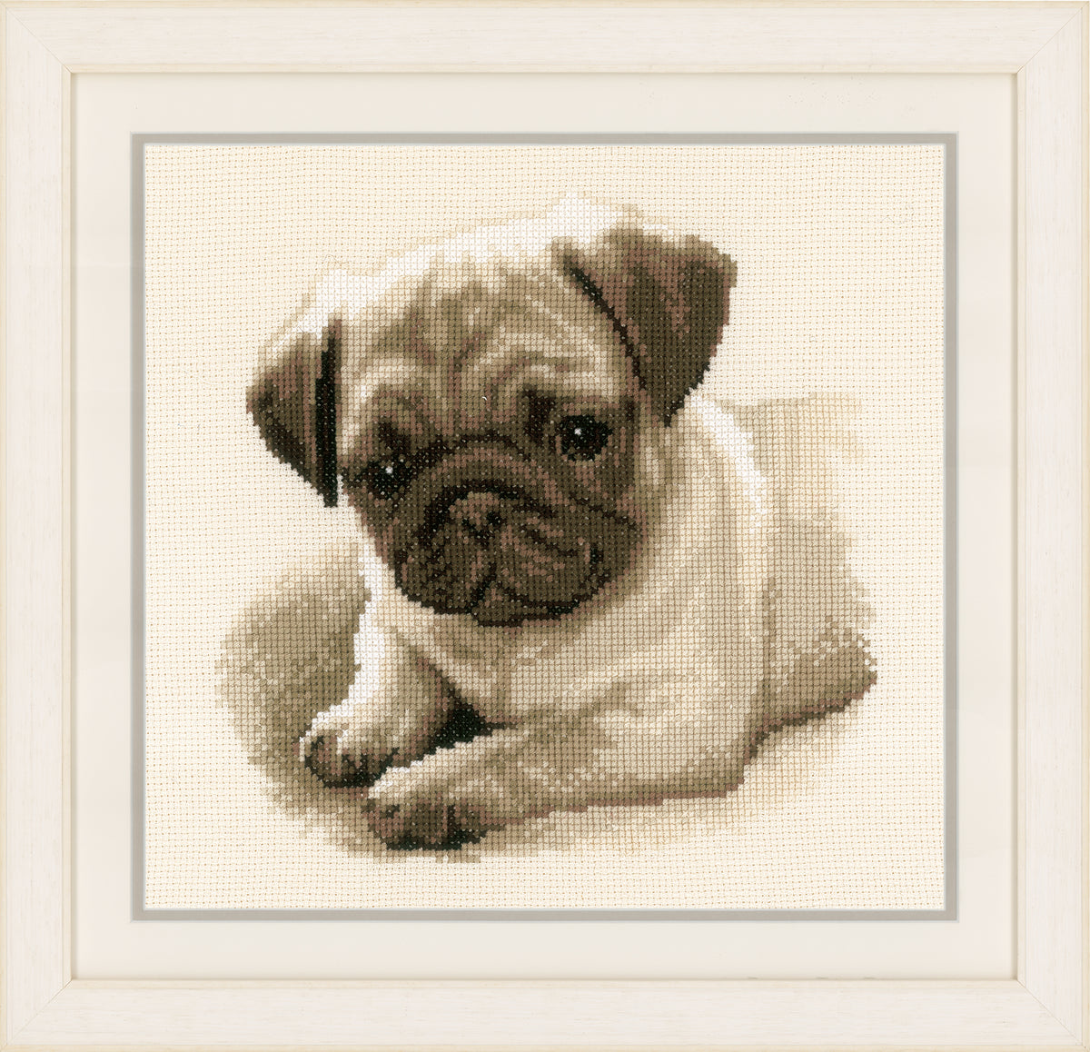Cross stitched portrait of a pug dog