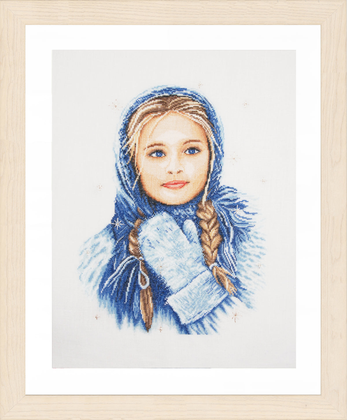Cross stitched girl in a winter scene