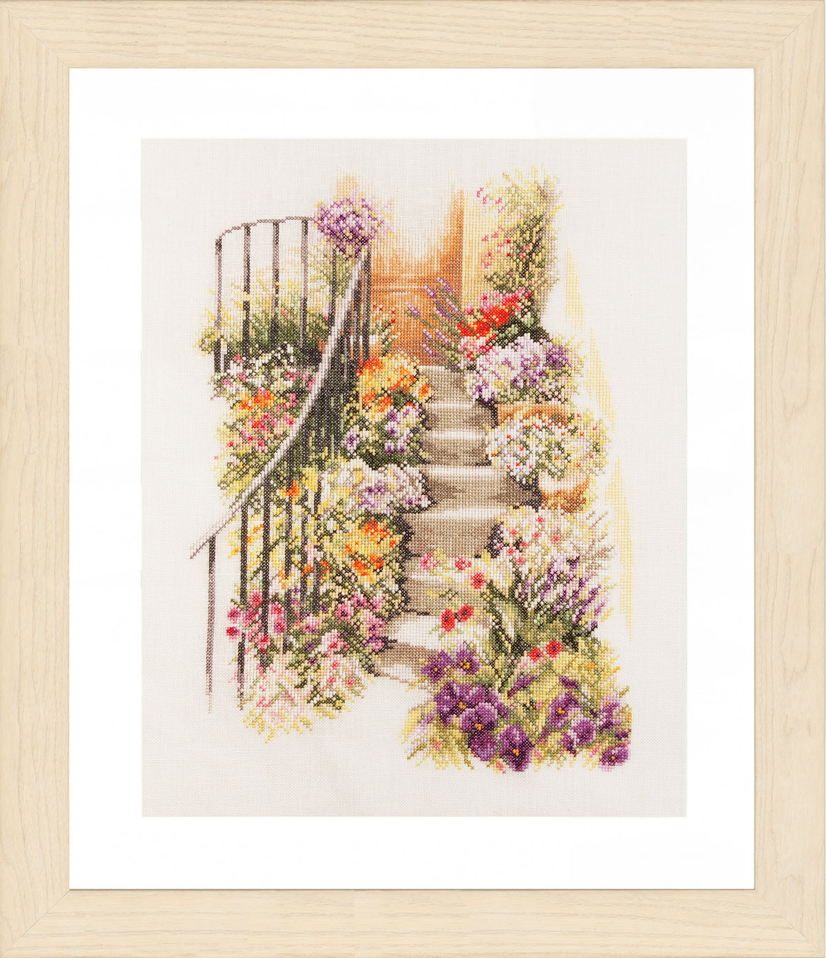 Cross stitched steps lined with flower pots