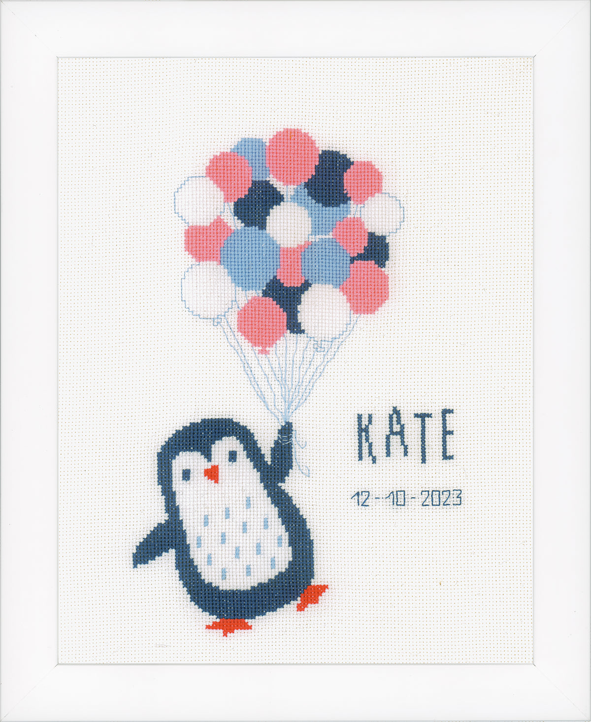 Cross stitched birth record with a penguin design