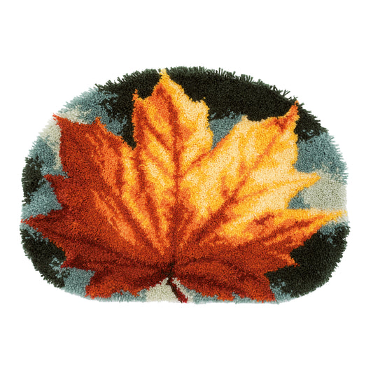 Leaf-shaped latch hook rug in autumn colours
