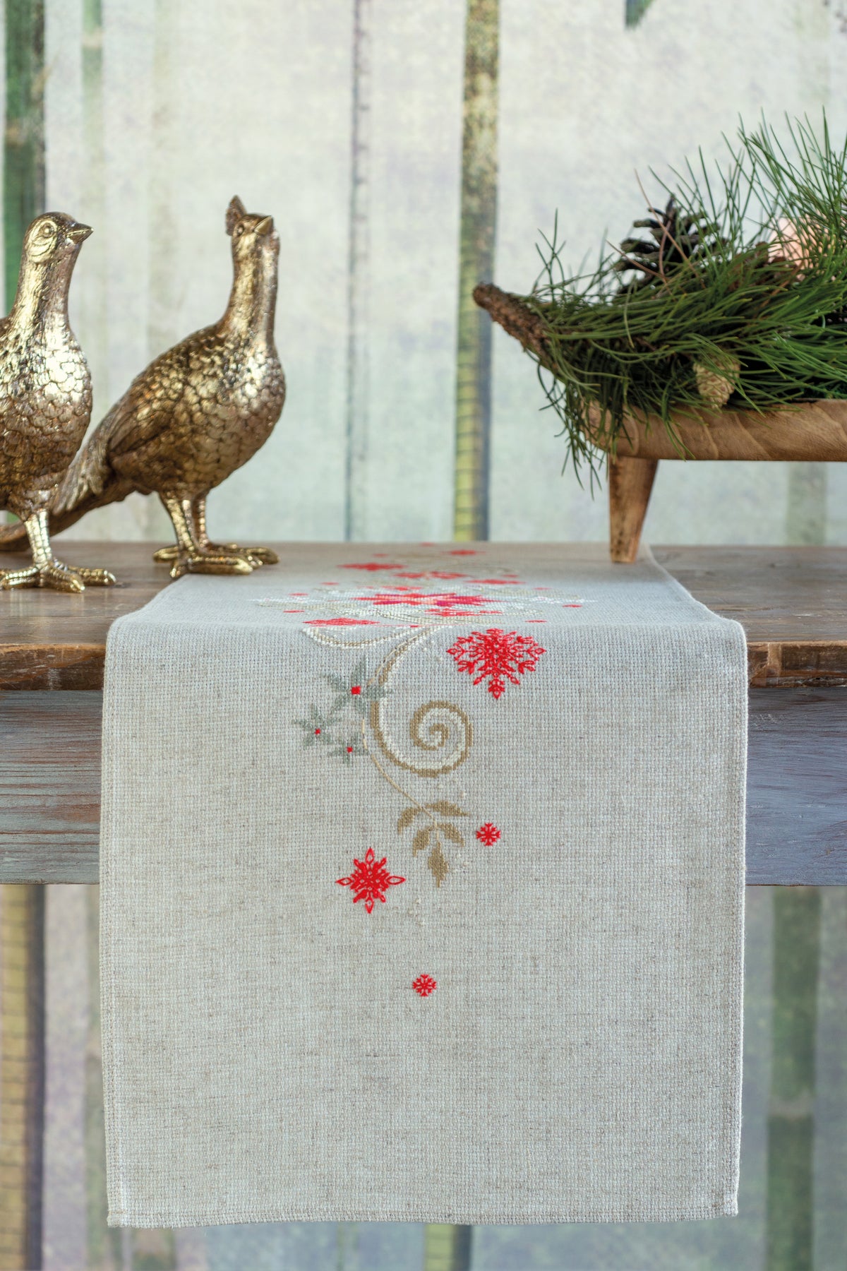 Cross stitched Christmas table runner on ecru fabric