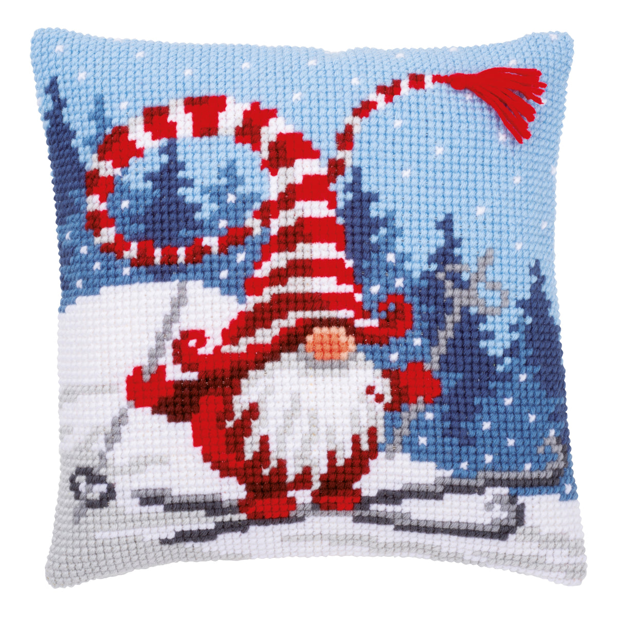 Cross stitch cushion with a skiing Christmas gnome