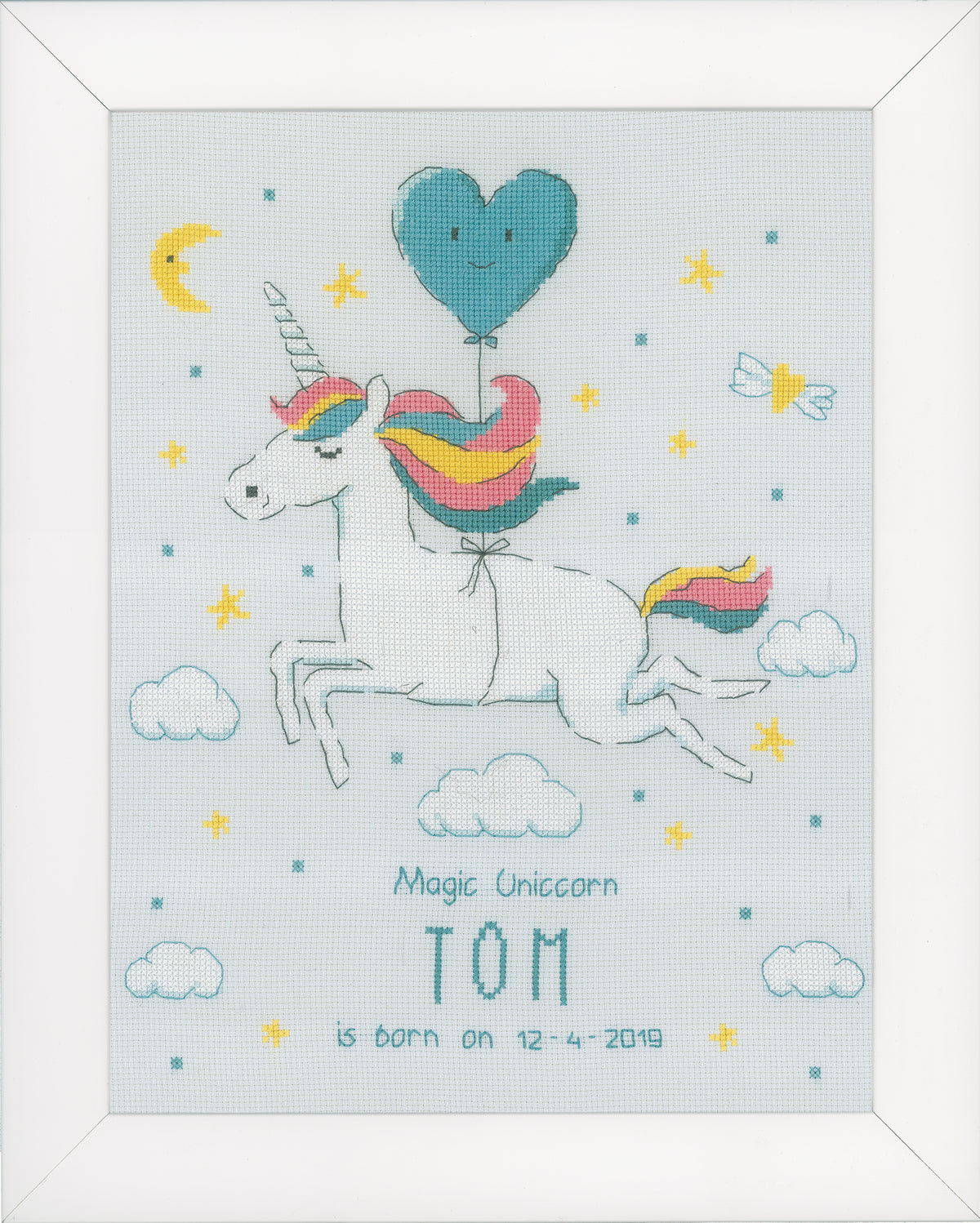 Unicorn birth record cross stitch on ice blue fabric