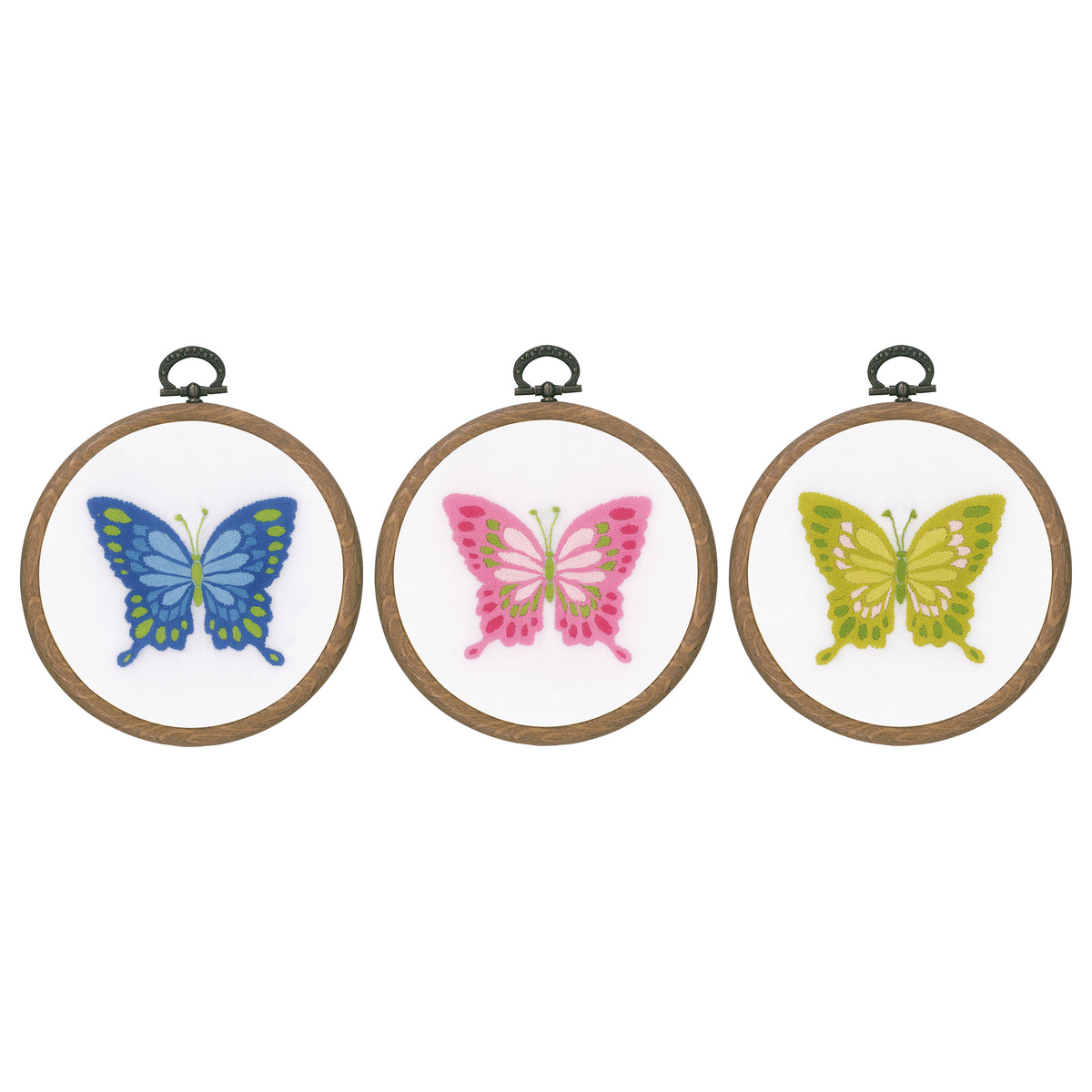 Three small wooden hoops with embroidered butterflies