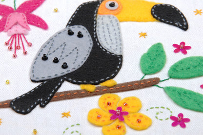 Toucan embroidery in a bamboo hoop