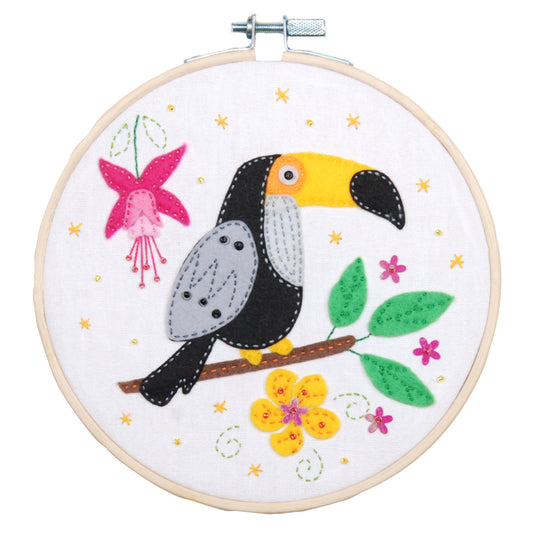 Toucan embroidery in a bamboo hoop