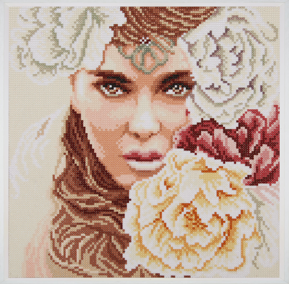Diamond painting of a face with striking eyes