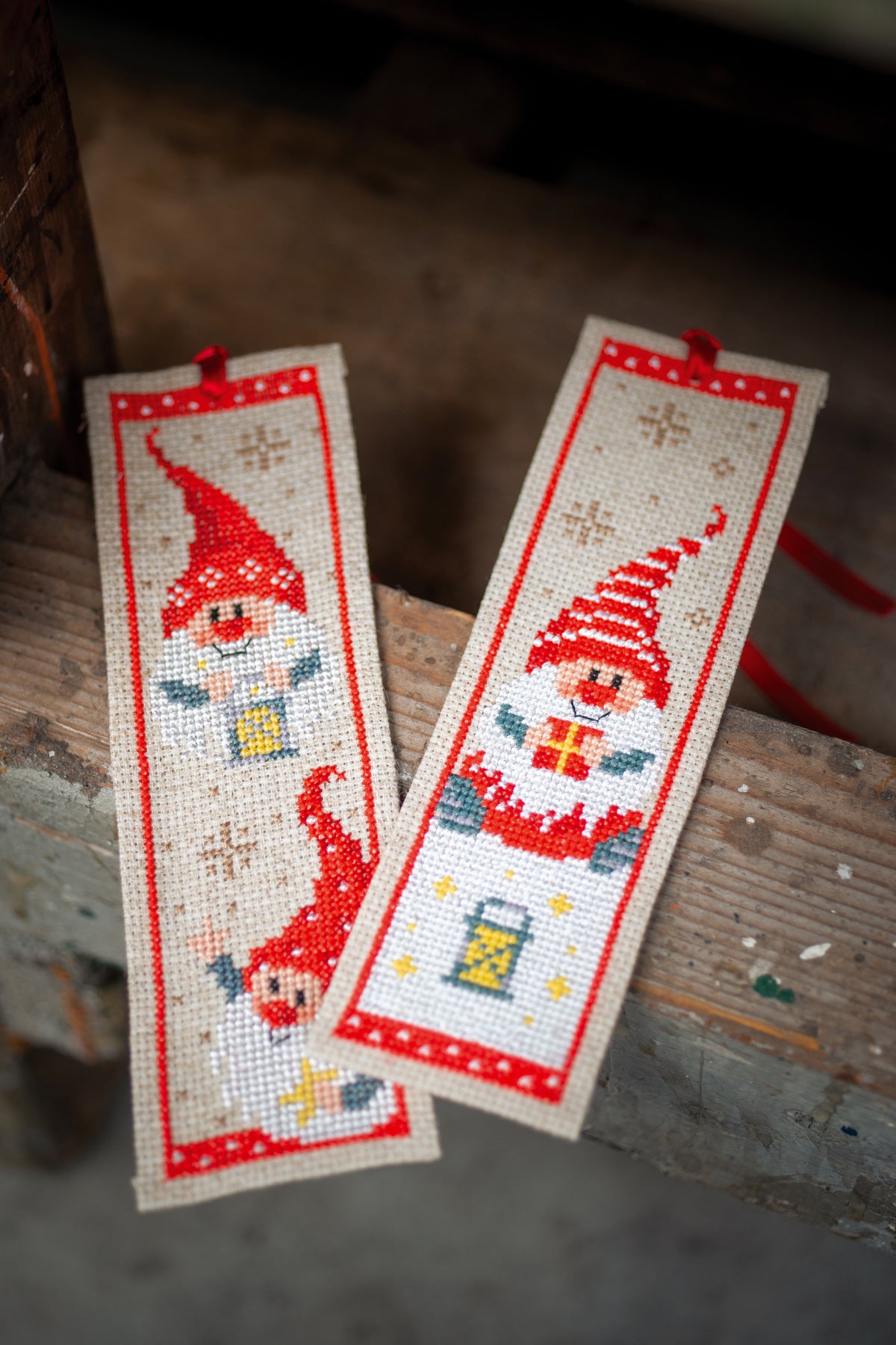 Two cross stitch bookmarks with Christmas gnome designs