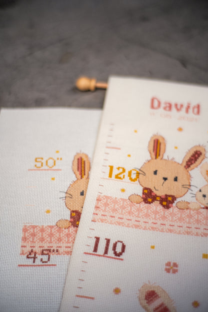 Long cross stitch design of bunnies