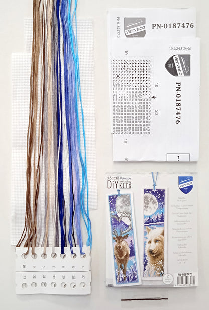 Two cross stitched bookmarks with a wolf and deer with moon design