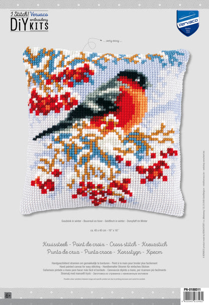 Cross stitch cushion with a goldfinch in winter design