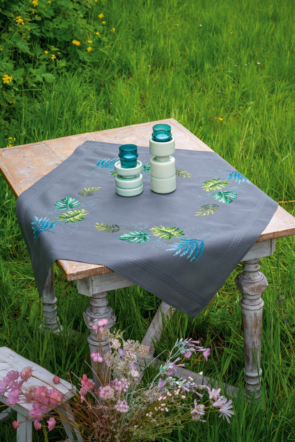 Embroidered tablecloth with a botanical leaves design
