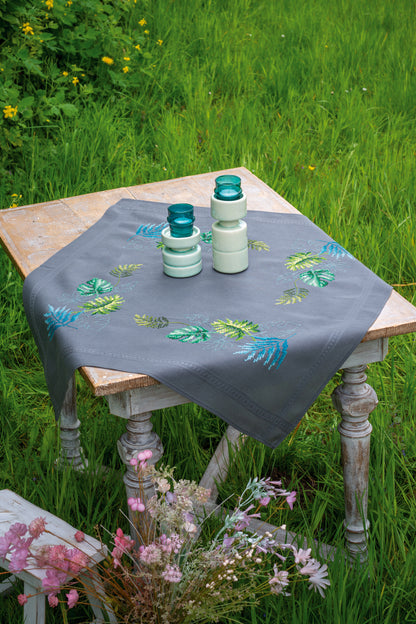 Embroidered tablecloth with a botanical leaves design