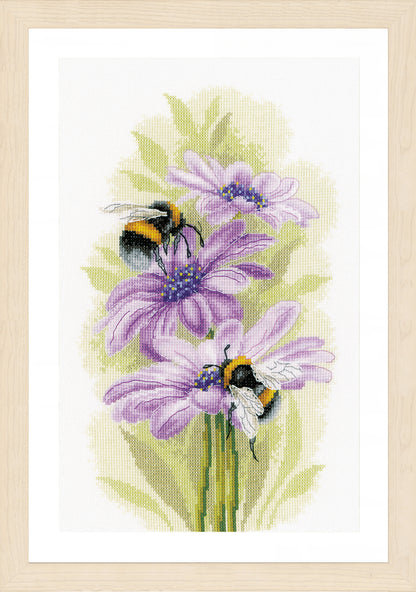 Cross stitch picture of dancing bees