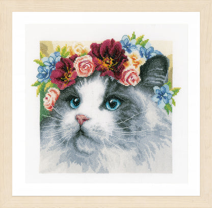 Cross stitch of a Ragdoll cat wearing a flower crown