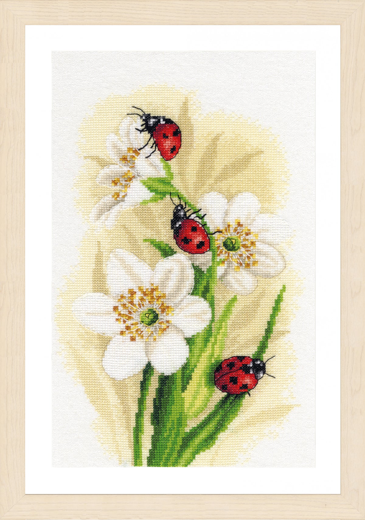 Cross stitch picture of ladybug parade