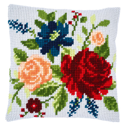 Finished Vervaco cross stitch cushion with peonies