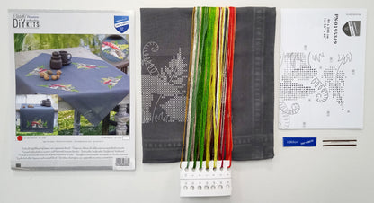 Grey table runner embroidered with a hedgehog and ferns