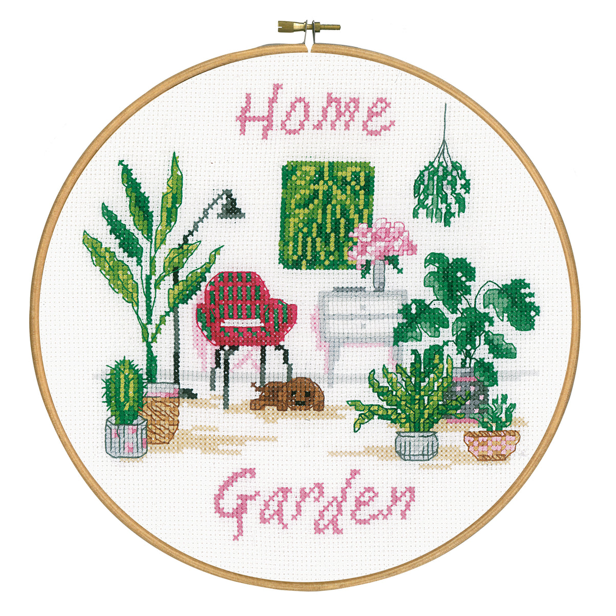 Cross stitched home garden design in an embroidery hoop