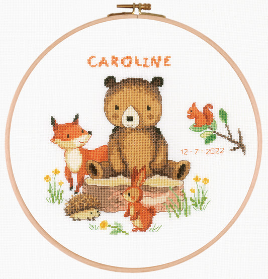 Forest animals cross stitch design in an embroidery hoop