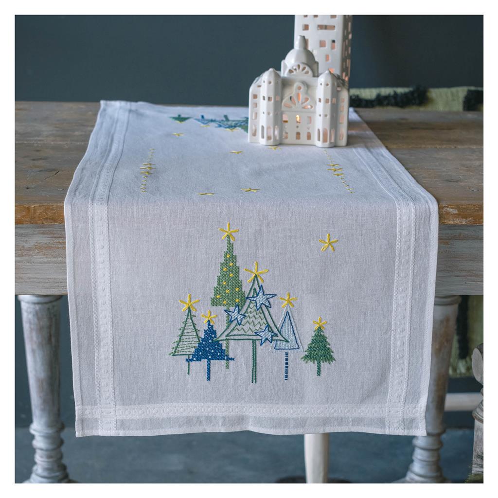 Embroidered table runner with modern pine trees
