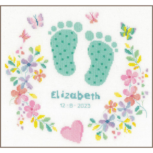 Cross stitch birth record with a pair of baby footprints