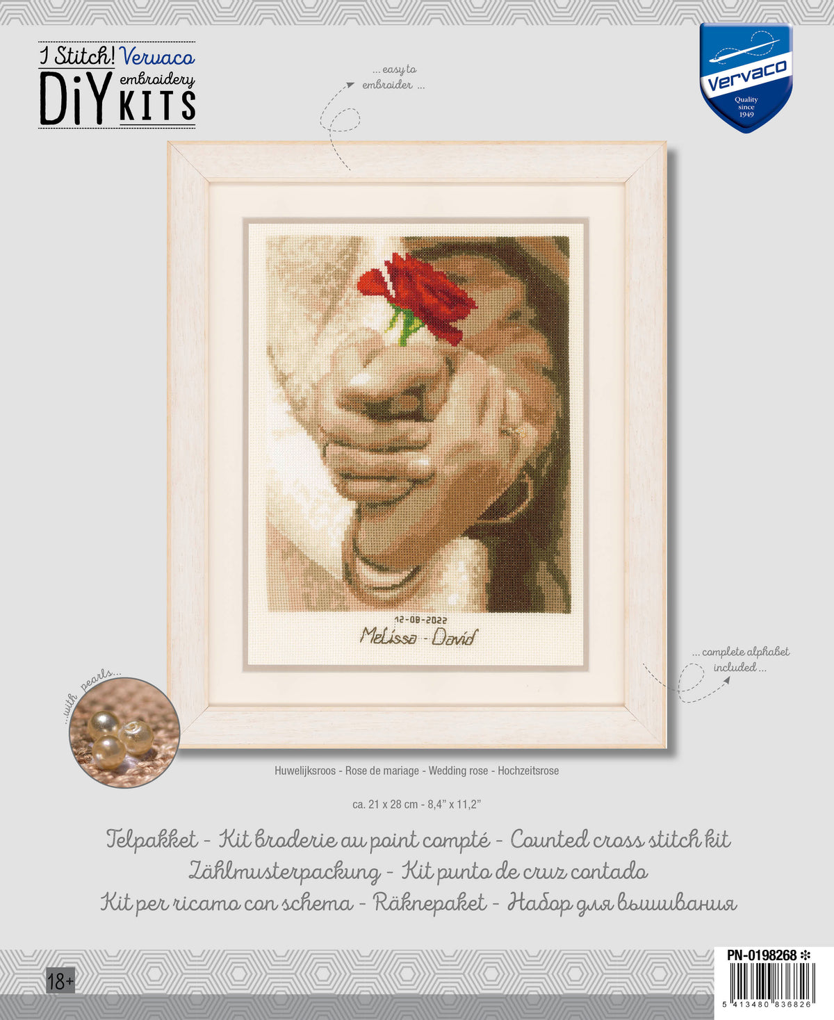 Cross stitch wedding record decorated with roses