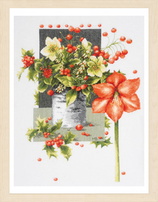 Cross stitch picture of red amaryllis flowers with Christmas holly