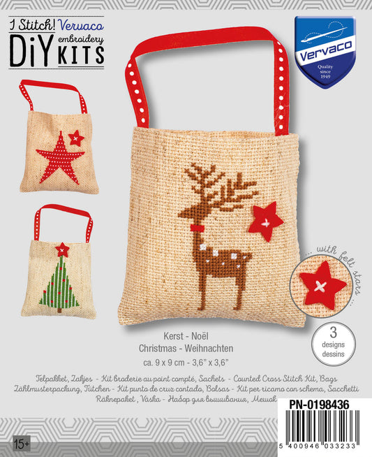 Three small aida bags cross stitched with Christmas designs