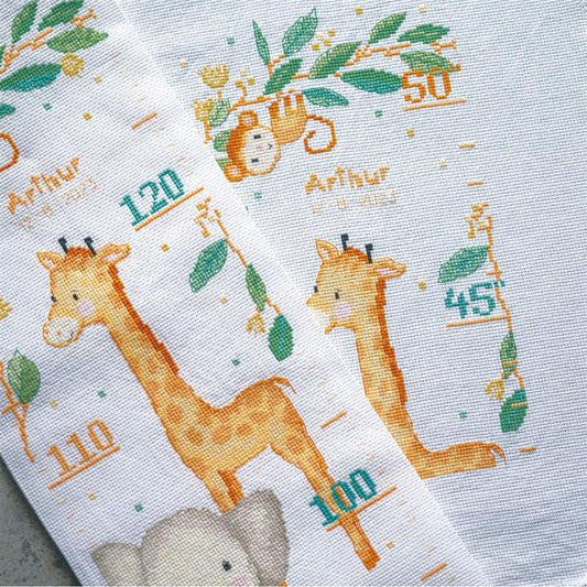 Long cross stitch height chart decorated with jungle animals